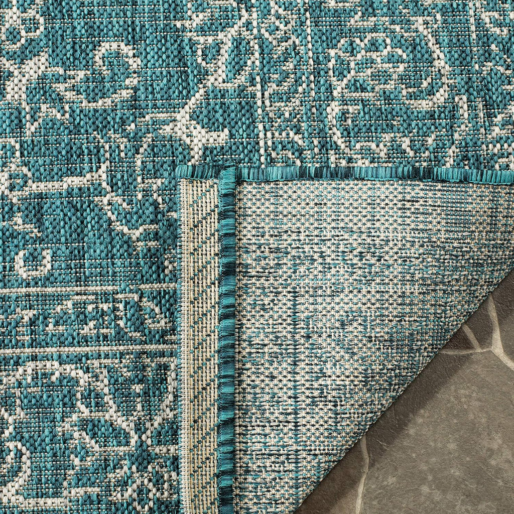 6'7" x 9'6" Turquoise Area Rug Z265